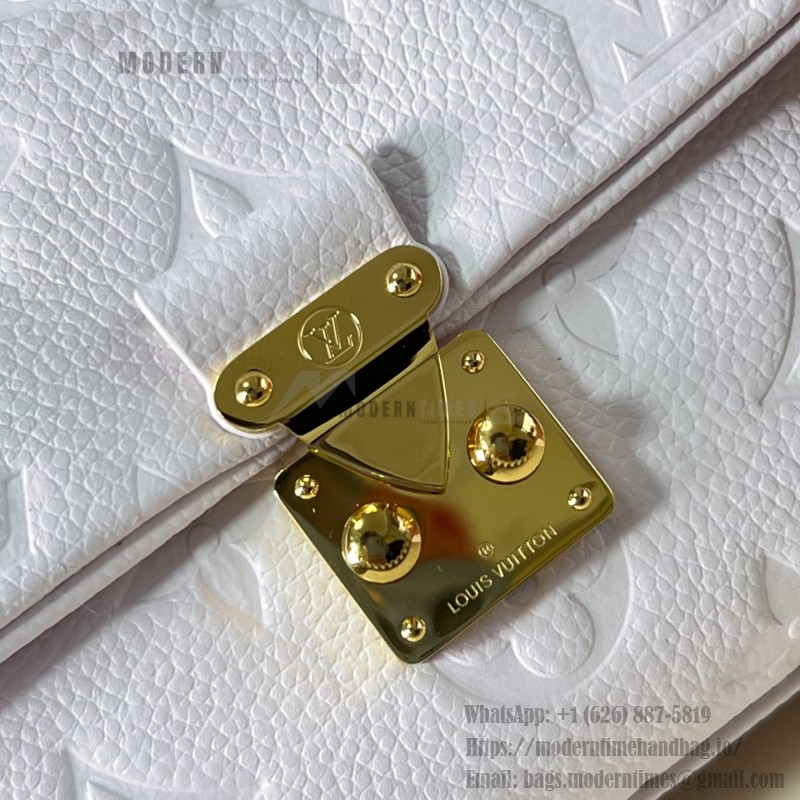 Louis Vuitton Nano Madeleine M29378 Monogram Empreinte leather handbag in Yellow and Purple