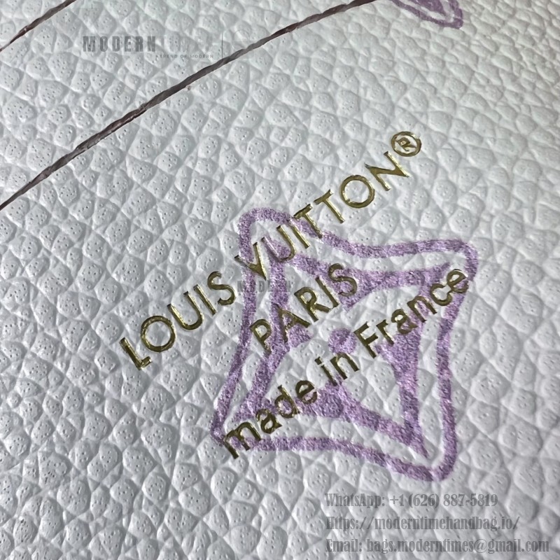 Louis Vuitton Nano Madeleine M29378 Monogram Empreinte leather handbag in Yellow and Purple