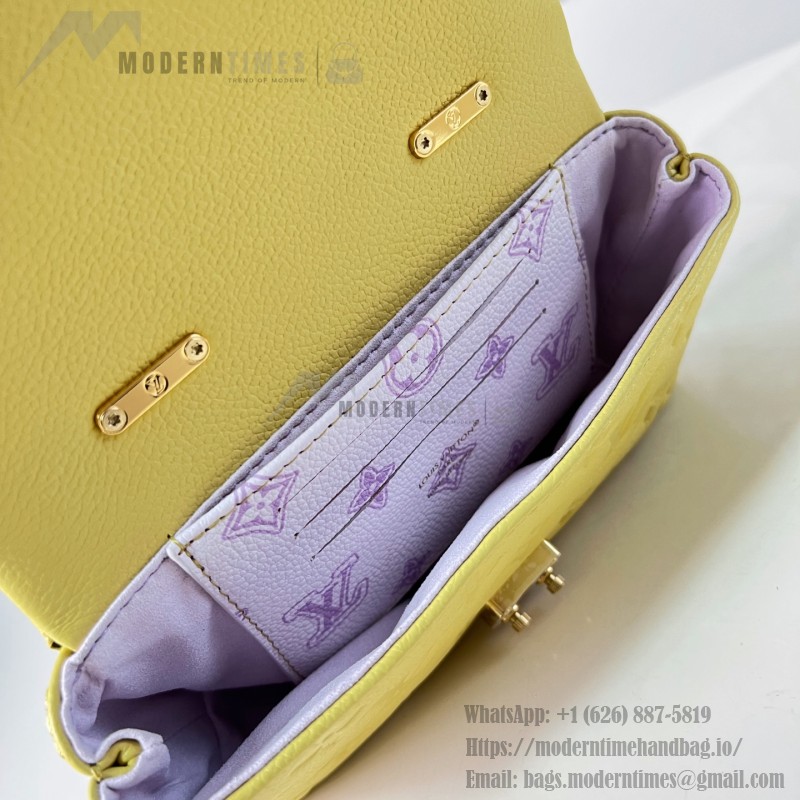 Louis Vuitton Nano Madeleine M29378 Monogram Empreinte leather handbag in Yellow and Purple