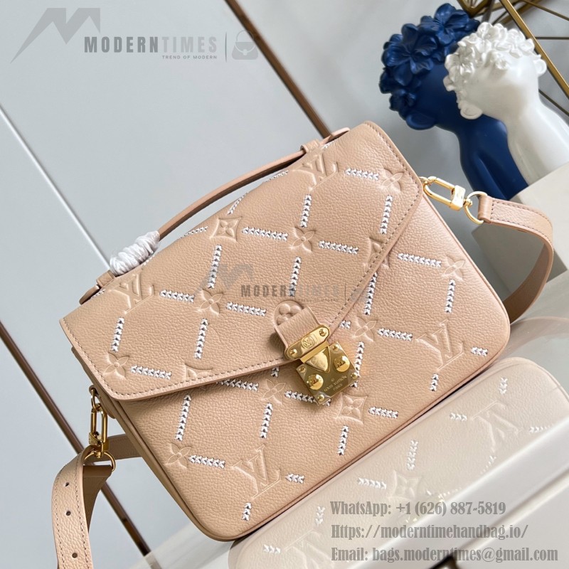 Louis Vuitton Pochette Métis M29497 Monogram Empreinte leather handbag with S-lock closure