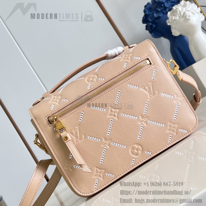 Louis Vuitton Pochette Métis M29497 Monogram Empreinte leather handbag with S-lock closure