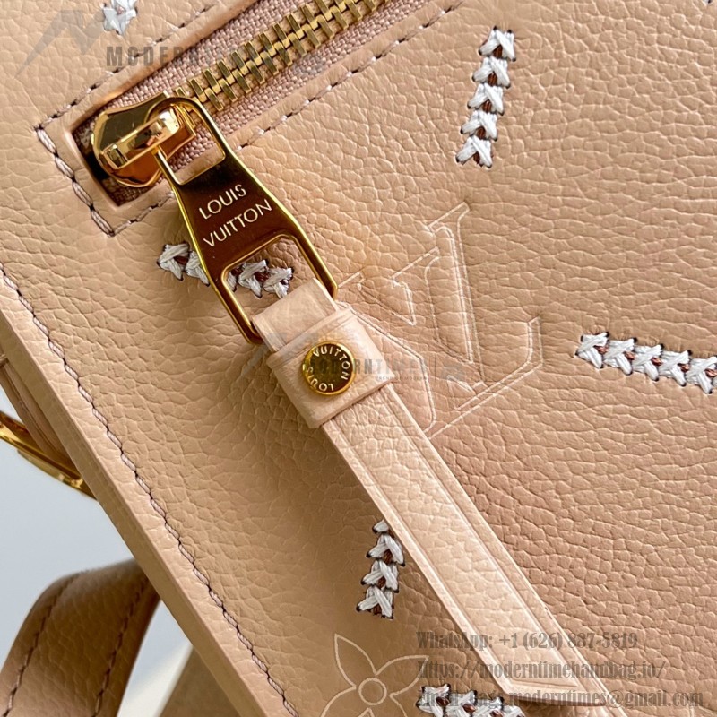 Louis Vuitton Pochette Métis M29497 Monogram Empreinte leather handbag with S-lock closure