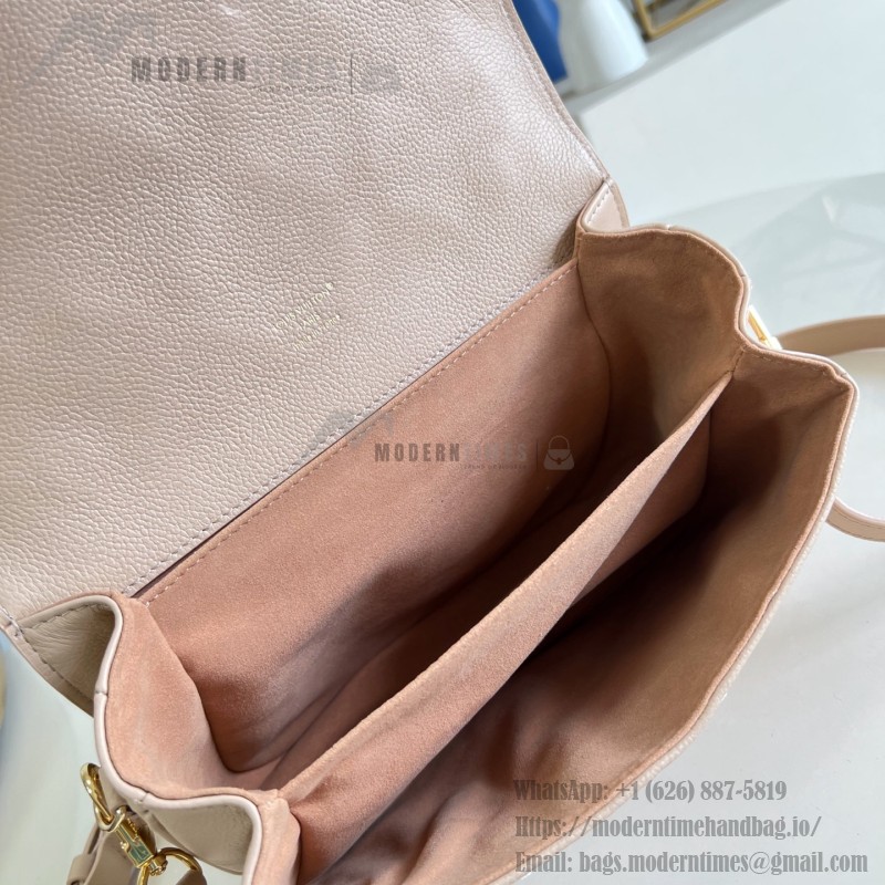 Louis Vuitton Pochette Métis M29497 Monogram Empreinte leather handbag with S-lock closure