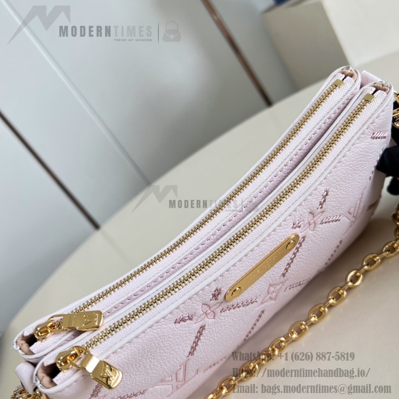Louis Vuitton Liv Pochette M29495 Monogram Empreinte leather handbag with gold chain and double zip closure