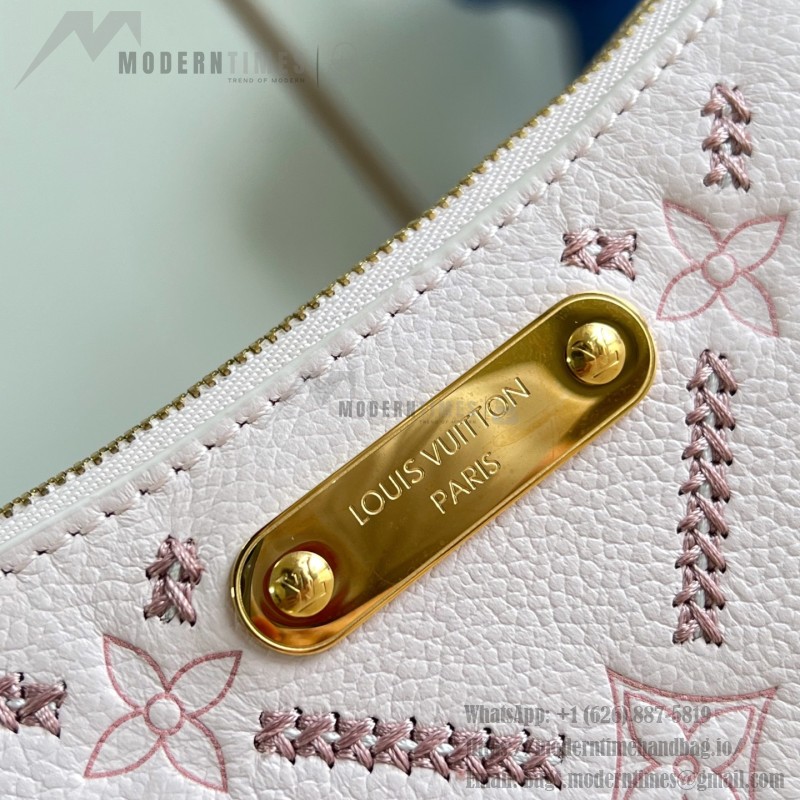 Louis Vuitton Liv Pochette M29495 Monogram Empreinte leather handbag with gold chain and double zip closure