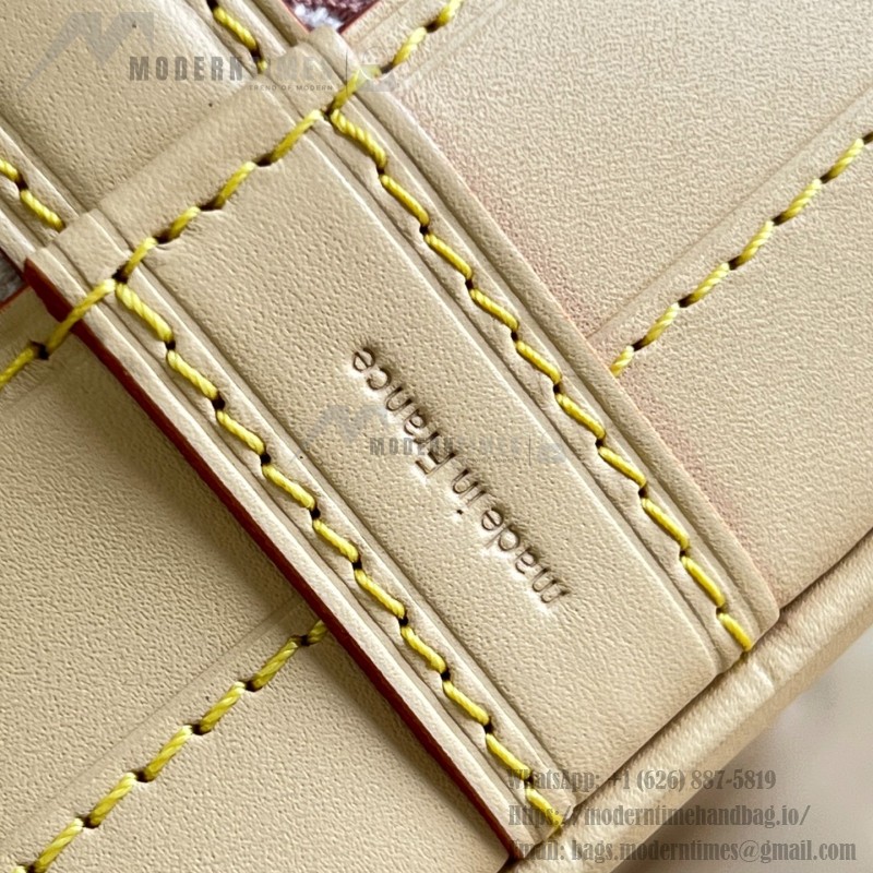 Louis Vuitton Noé M28714 Monogram Emblème jacquard shoulder bag with contrasting leather trim