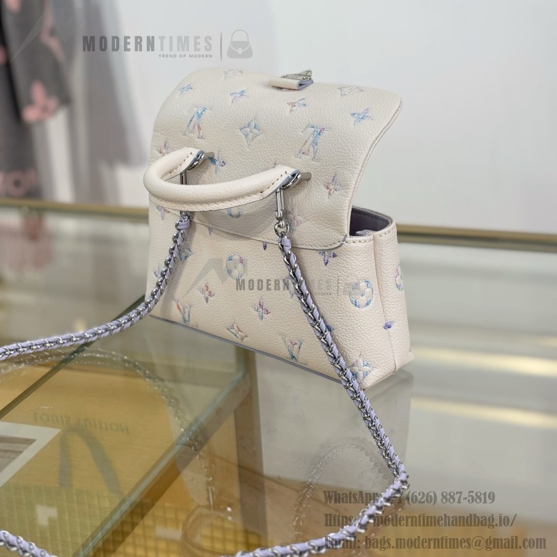 Louis Vuitton Nano Madeleine M2A374 premium fabric handbag with durable metal hardware