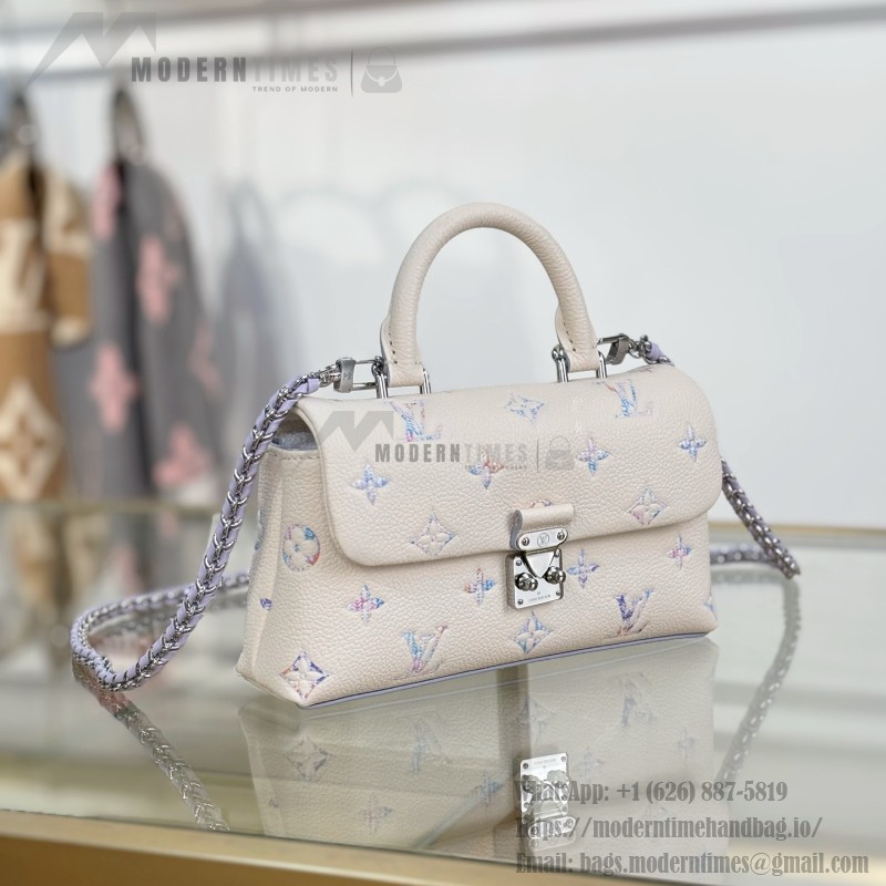 Louis Vuitton Nano Madeleine M2A374 premium fabric handbag with durable metal hardware