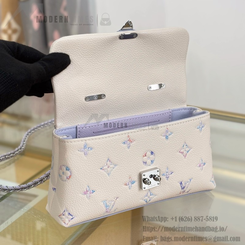 Louis Vuitton Nano Madeleine M2A374 premium fabric handbag with durable metal hardware