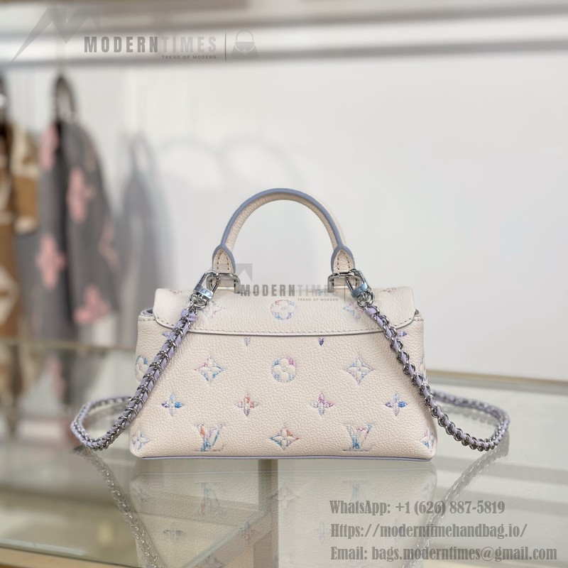 Louis Vuitton Nano Madeleine M2A374 premium fabric handbag with durable metal hardware