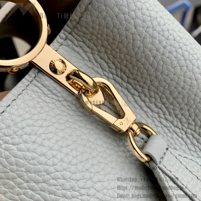 Louis Vuitton Capucines MM Handbag M21296 Mini in Elegant Leather