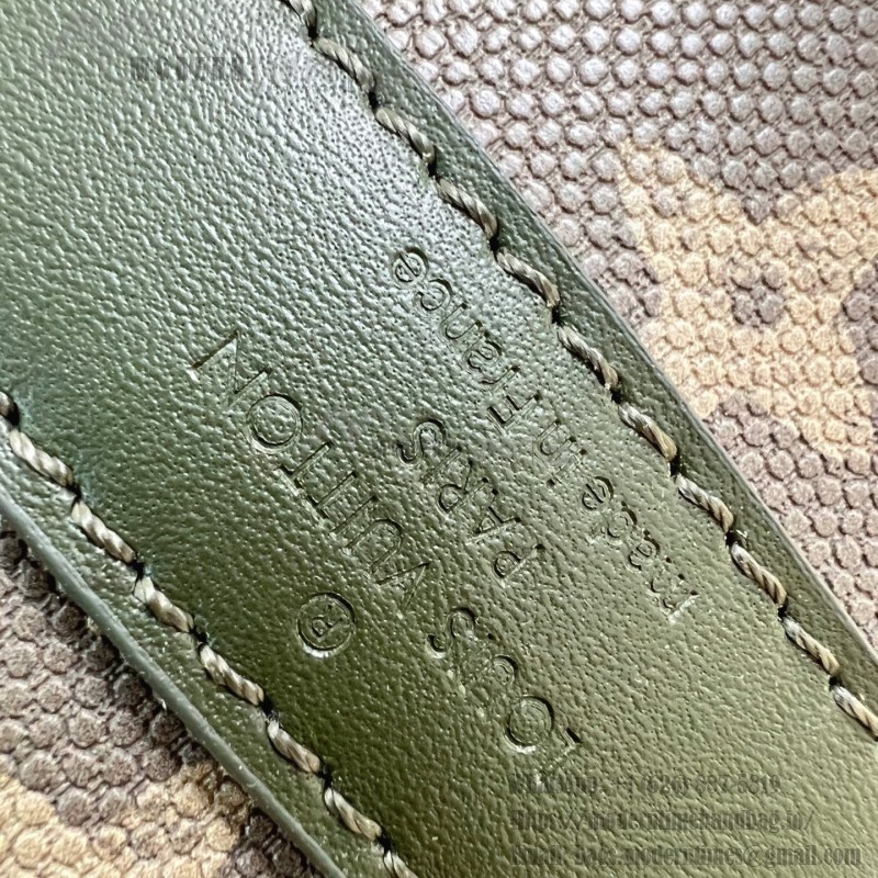 Louis Vuitton Keepall Bandoulière 50 Travel Bag with camouflage Monogram Surplus and distressed metal hardware