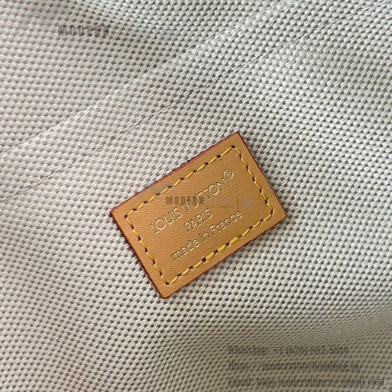 Louis Vuitton Nil Crossbody Bag with Monogram Heritage canvas and leather handle