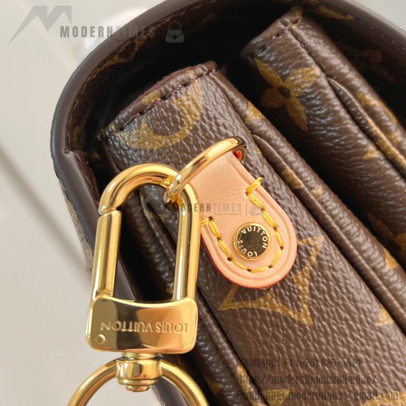 Louis Vuitton Pochette Métis Handbag with Monogram Canvas and polished S-lock closure