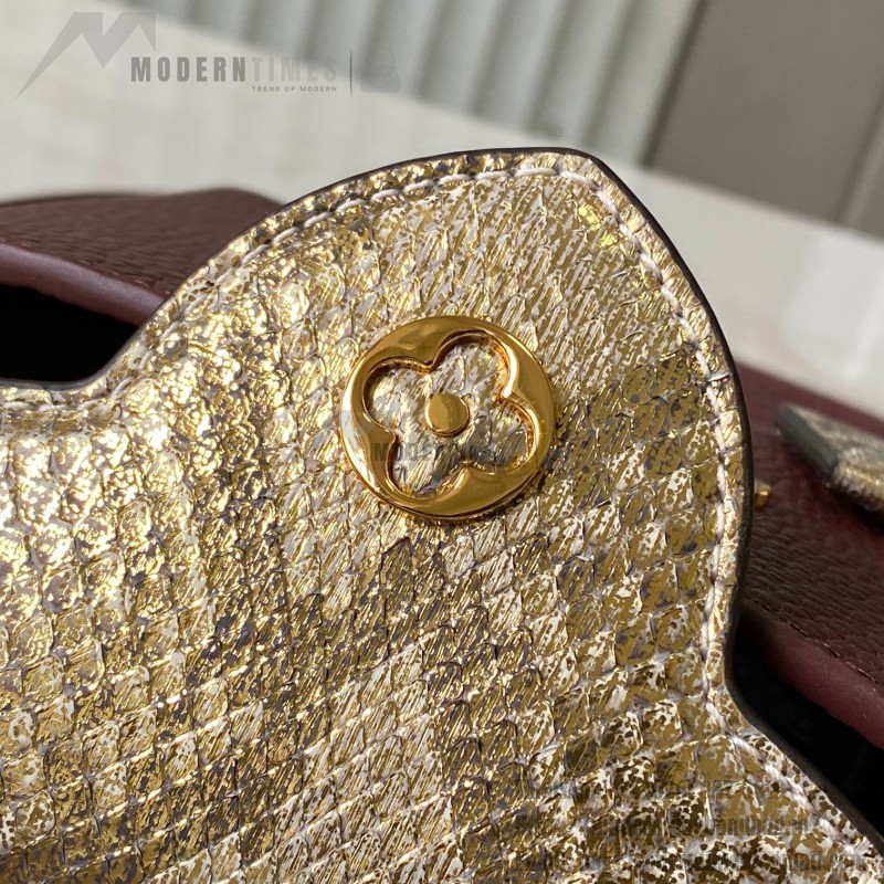 Louis Vuitton Capucines Bag in Burgundy with Golden Snake Handle and Monogram Chain