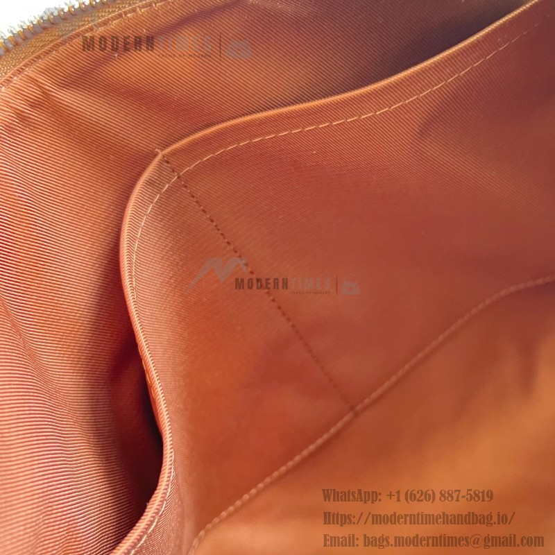 Louis Vuitton Keepall Bandoulière 35 in Waxed Calfskin with LV Initials Embossing