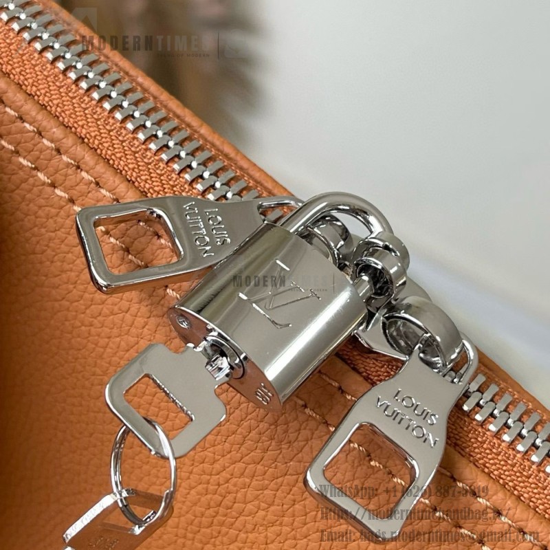 Louis Vuitton Keepall Bandoulière 50 Travel Bag in Caramel Waxed Leather with LV Initials and Antiqued Metal Hardware