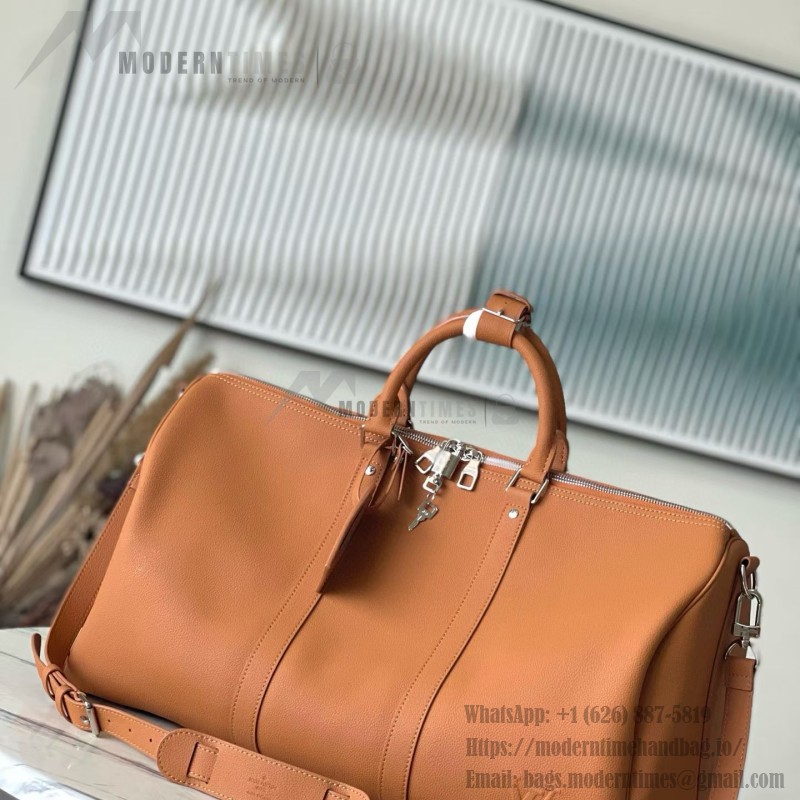 Louis Vuitton Keepall Bandoulière 50 Travel Bag in Caramel Waxed Leather with LV Initials and Antiqued Metal Hardware