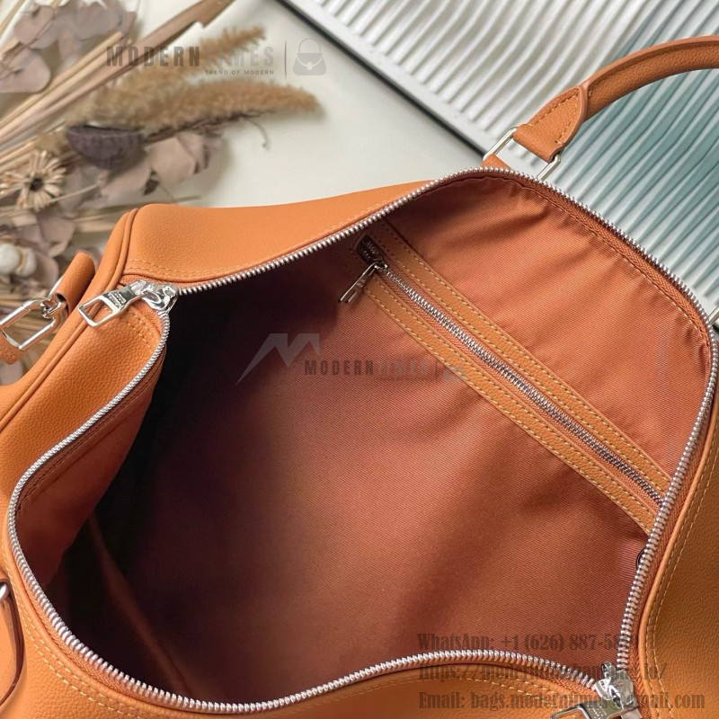 Louis Vuitton Keepall Bandoulière 50 Travel Bag in Caramel Waxed Leather with LV Initials and Antiqued Metal Hardware