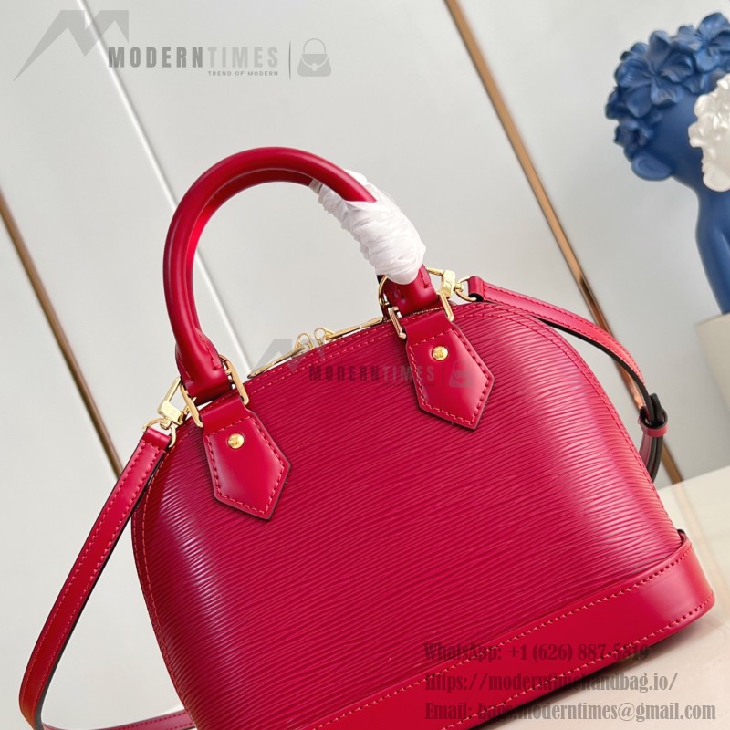 Louis Vuitton Alma BB Epi Leather Handbag with Monogram Jacquard Strap