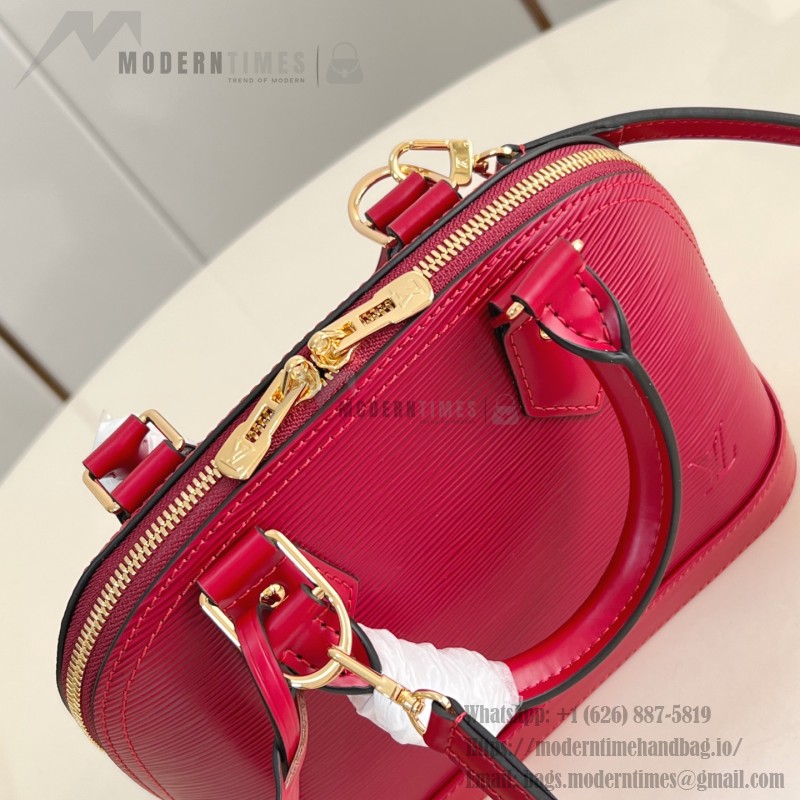 Louis Vuitton Alma BB Epi Leather Handbag with Monogram Jacquard Strap