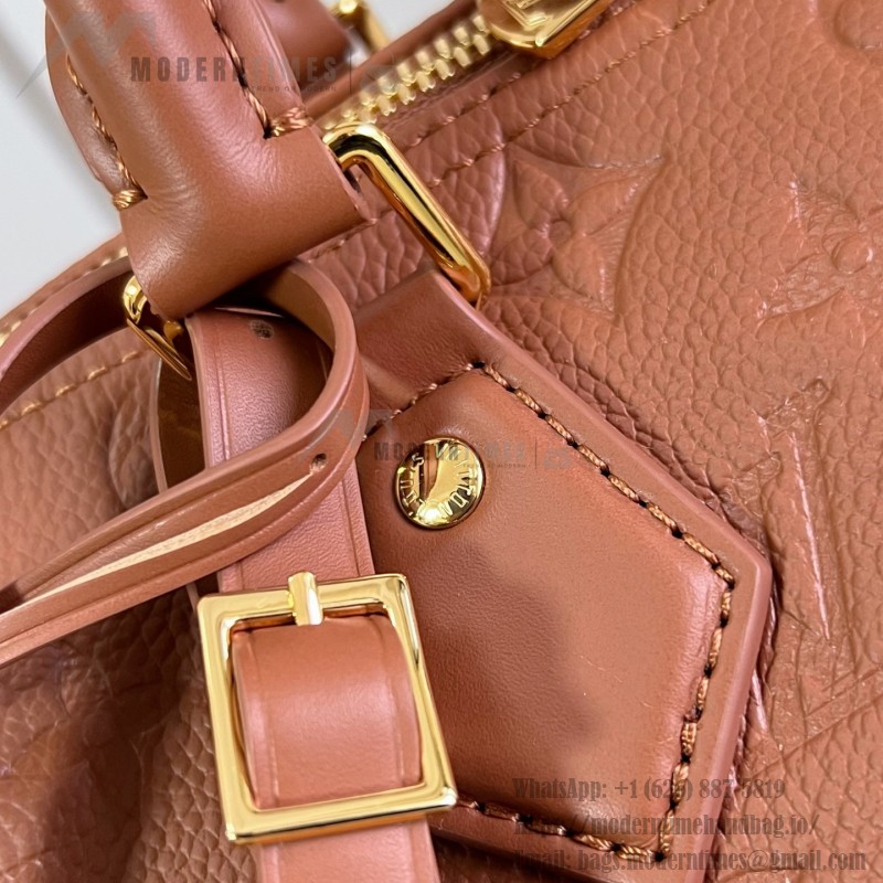 Louis Vuitton Speedy Soft 30 Handbag with Monogram Empreinte Leather and Suede Lining