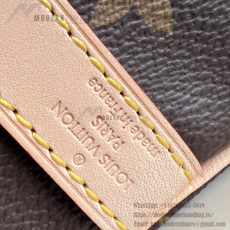 Louis Vuitton Speedy Bandoulière 25 Handbag with Monogram Canvas and Leather Handle