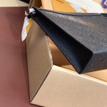 Replica Louis Vuitton M61692 Pochette Voyage in Black Embossed Cowhide Leather