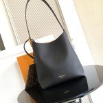 Louis Vuitton Low Key Hobo Bag in grained calfskin leather with adjustable shoulder strap