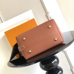 Louis Vuitton Low Key Hobo Bag in grained calfskin leather with adjustable shoulder strap