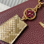 Louis Vuitton Capucines Bag in Burgundy with Golden Snake Handle and Monogram Chain