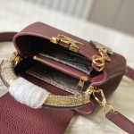 Louis Vuitton Capucines Bag in Burgundy with Golden Snake Handle and Monogram Chain