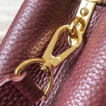 Louis Vuitton Capucines Bag in Burgundy with Golden Snake Handle and Monogram Chain