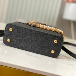 Louis Vuitton Capucines East-West Why Knot Taurillon leather handbag in mini and small sizes with Monogram beaded chain and shiny metal hardware