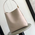 Louis Vuitton Low Key Hobo Bag in grained calfskin leather with adjustable shoulder strap