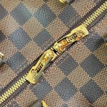 Louis Vuitton Speedy Bandoulière 25 Handbag with Damier Ebene Canvas and Leather Handle