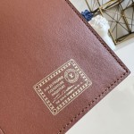Louis Vuitton M26059 coated canvas passport cover multi color
