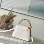 Louis Vuitton Capucines Mini Handbag with rhinestone LV letters and Flower Crown handle