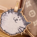 Louis Vuitton Escape Handbag M15134 featuring the Meowgram pattern and hand-painted cat leather embellishment