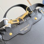 LV Coussin Backpack Medium Black replica with monogram embossed leather