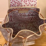 Louis Vuitton Montsouris Small Backpack M15135 featuring Meowgram pattern and detachable cat-shaped key pouch