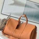 Louis Vuitton Keepall Bandoulière 50 Travel Bag in Caramel Waxed Leather with LV Initials and Antiqued Metal Hardware