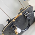 Louis Vuitton Alma PM Handbag in Monogram Canvas with Gold Lock and Key and Detachable Shoulder Strap