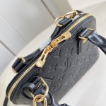 Louis Vuitton Alma BB Handbag in Monogram Canvas with Gold Lock and Key and Detachable Shoulder Strap