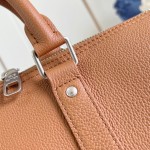 Louis Vuitton Keepall Bandoulière 35 in Waxed Calfskin with LV Initials Embossing