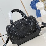 Louis Vuitton Speedy Trunk 20 Handbag in Monogram Saga Rock Style with Leather Details