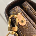 Louis Vuitton Pochette Métis Handbag with Monogram Canvas and polished S-lock closure