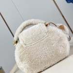 Louis Vuitton Capusnow Bag with Removable Pom-Pom Charms