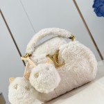 Louis Vuitton Capusnow Bag with Removable Pom-Pom Charms