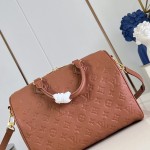Louis Vuitton Speedy Soft 30 Handbag with Monogram Empreinte Leather and Suede Lining